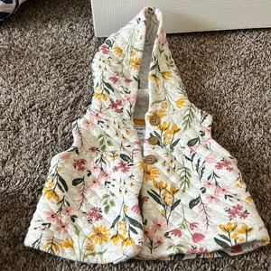 Soft, gently used floral vest with hood for 3 month old girl.